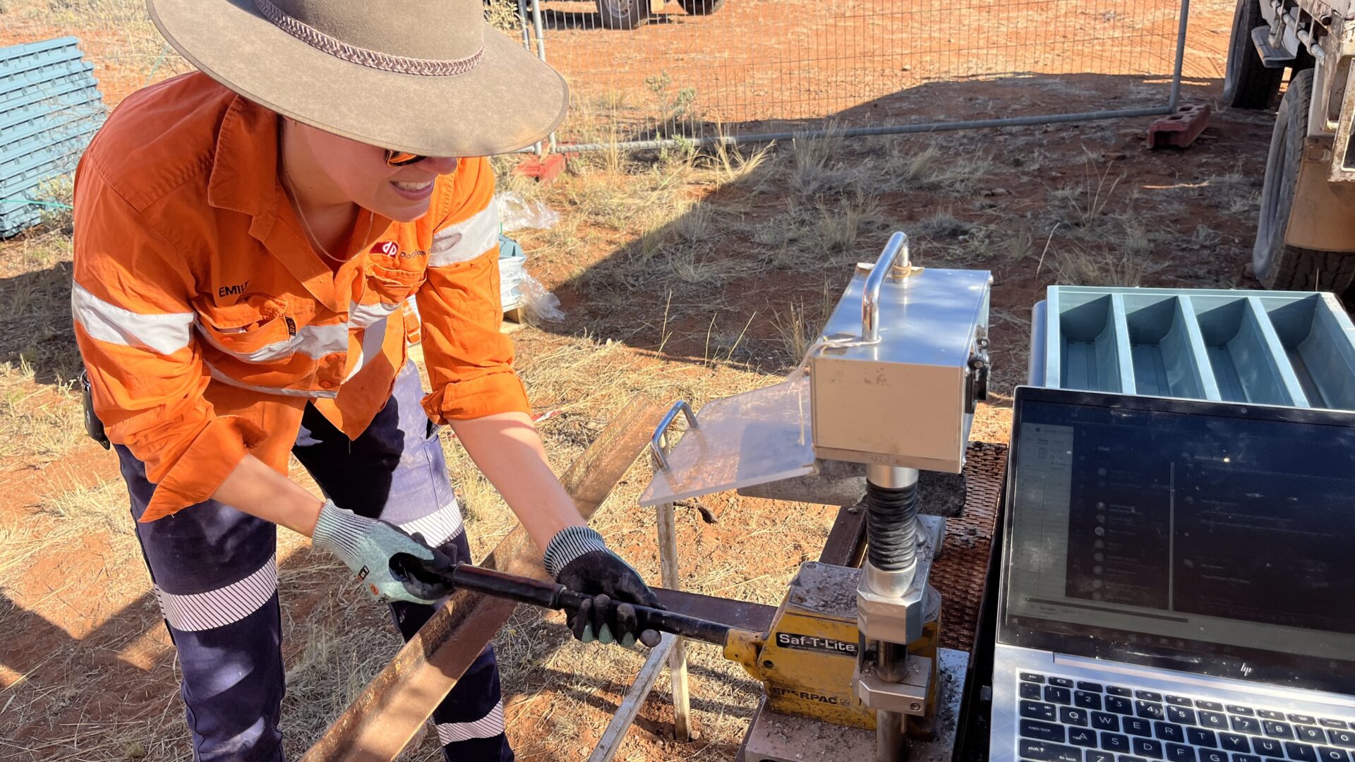 Emily performing detailed logging, sampling, and laboratory testing